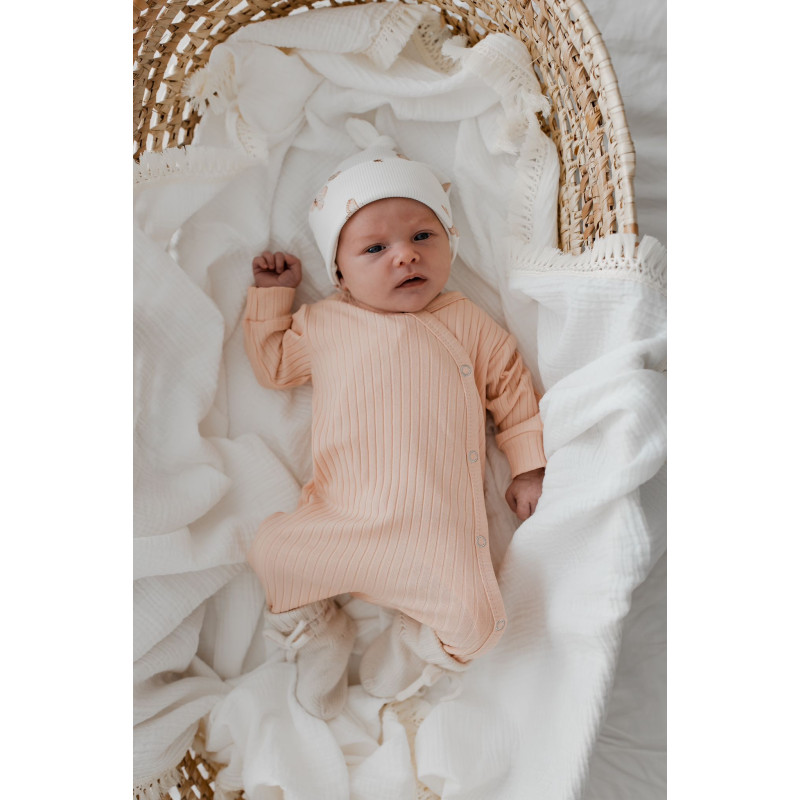 Newborn overslag boxpakje lichtroze in een brede ribstof.