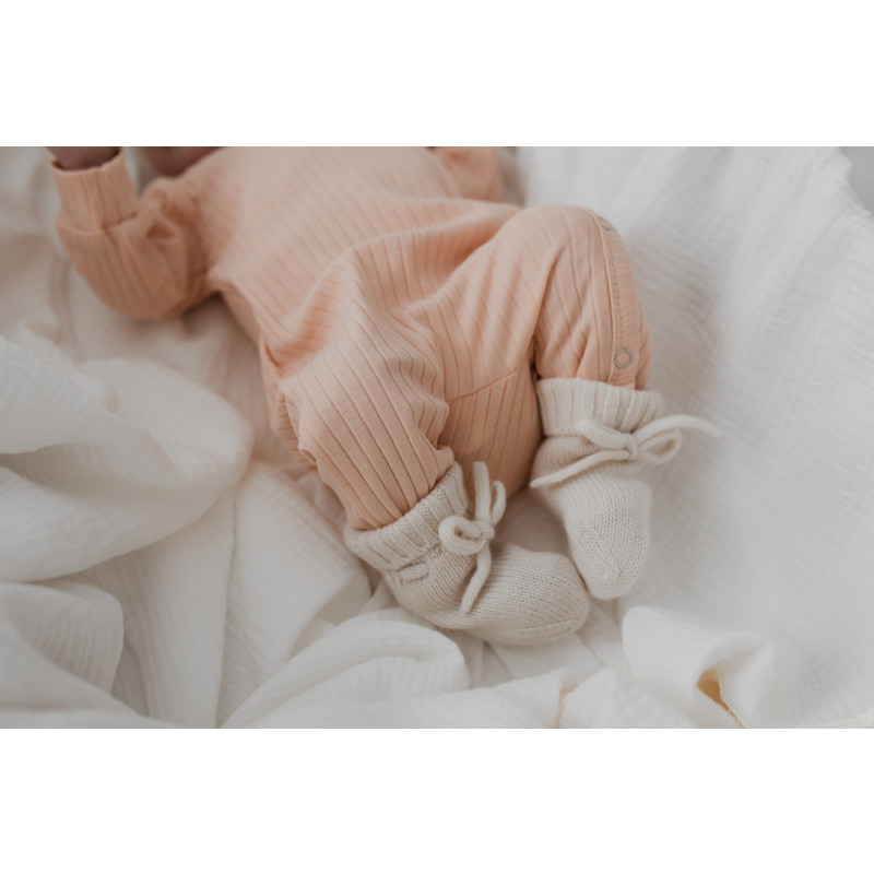 Newborn overslag boxpakje lichtroze in een brede ribstof.