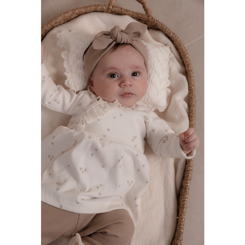 Newborn babyjurkje met ruffles en kleine hartjes