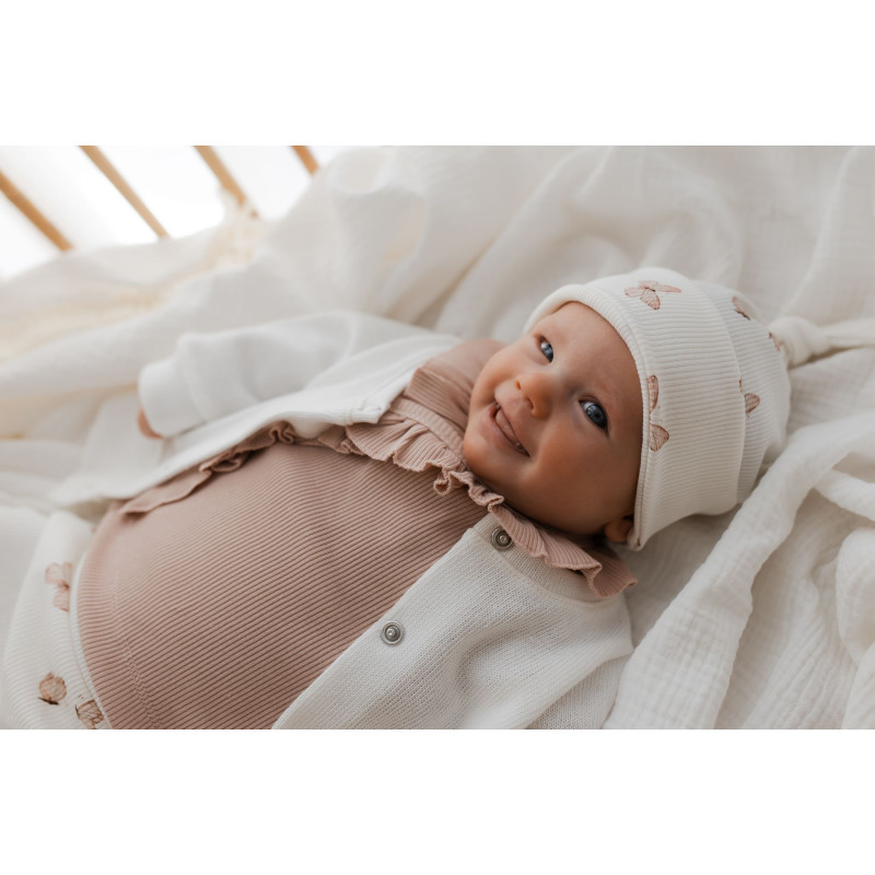 Newborn babyshirt overslag in een nude roze kleur.