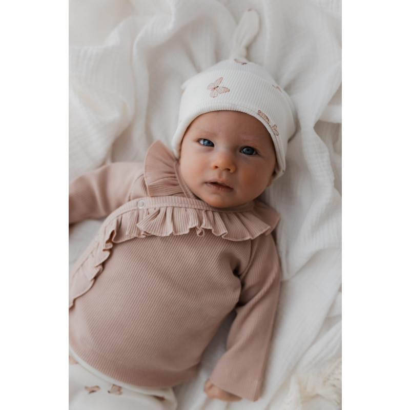 Newborn overslagshirtje met ruffles in roze nude.