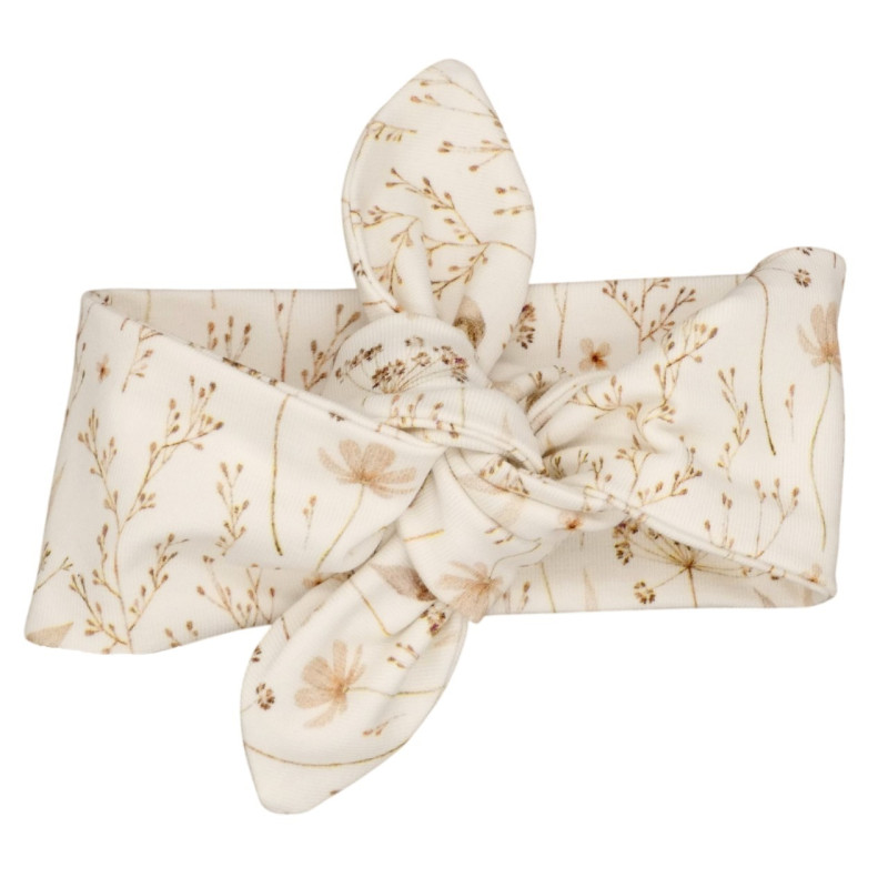 Newborn haarbandje met lichte zandkleurige bloemen