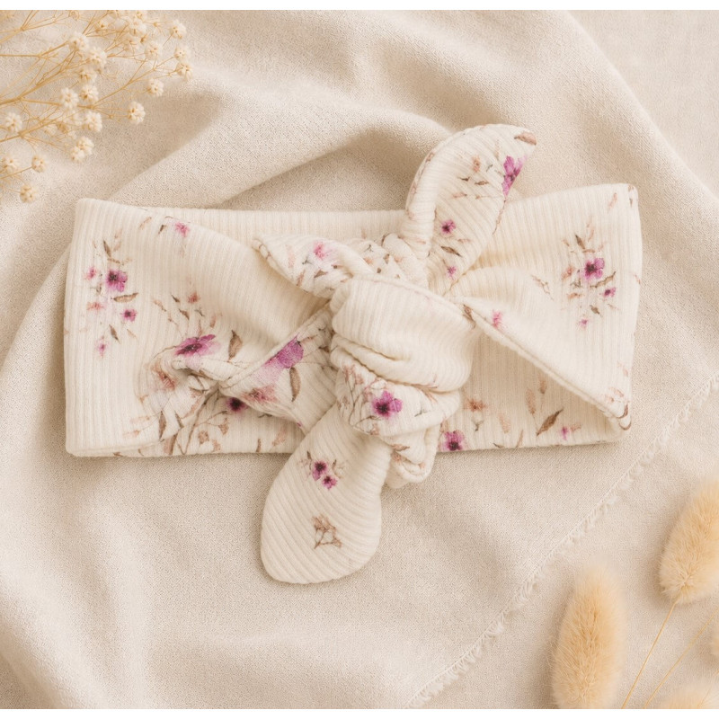 Newborn haarbandje met kleine roze bloemetjes in een ribstof.