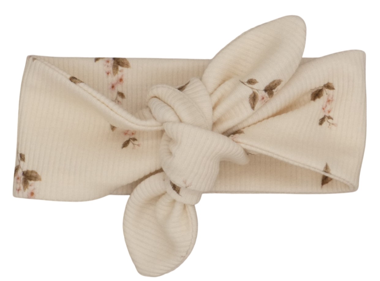Newborn haarbandje met kleine roze roosjes in een ribstof.